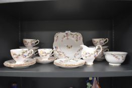 A part tea service by Tuscan china in a Butterfly design