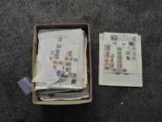 A box containing World and Commonwealth Stamps, on albums pages, on paper and on stock cards, mint &