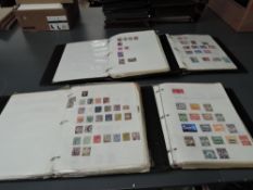 A collection of Commonwealth & GB Stamps, mint & used in four albums, Penny Black seen