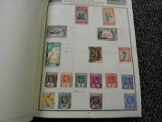 A well filled Ajax Stamp Album containing GB and World Stamps, older stamps well noted
