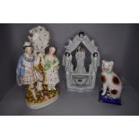 Three Staffordshire flat back figures including tin glaze Virgin Mary and child on pulpit