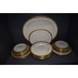 A set of cream and gold glaze dinner and dessert plates by Cauldon