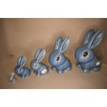 A set of graduated blue glaze bunny rabbit figures by Sylvac