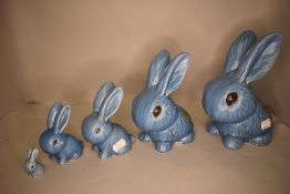 A set of graduated blue glaze bunny rabbit figures by Sylvac