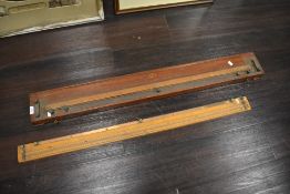 Two scientific wooden meter bridges or similar