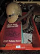 A mixed lot containing workshop manuals,a vintage helmet, twin 40 Weber carbs and more.