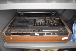 A mid century style cassette radio deck by Akai GXC-40T