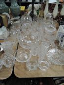 A large collection of cut glass including bowls,beakers and more.