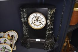 A late Victorian slate mantle or bracket clock of large size having marble base and column with