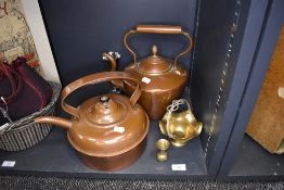 Two copper stove top kettles and similar metal wares