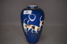 A Wedgwood lustre vase having hand decorated fox hound design