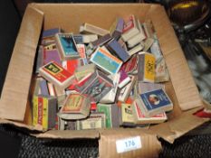 A box full of vintage collectable matchboxes.