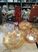 A mixed lot of carnival glass and art glass including vases and bowls.