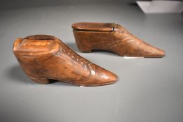 Two late Georgian carved snuff boxes in the form of boots.