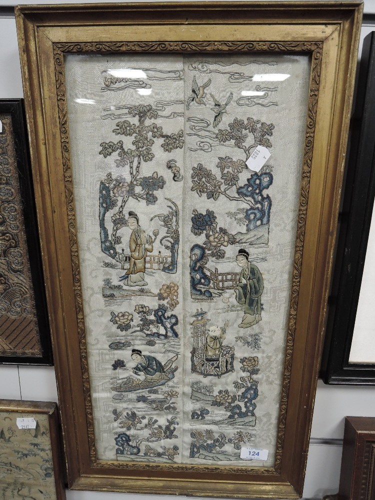 A framed Chinese silk screen needle work embroidery of a fantasy landscape in gilt frame possibly