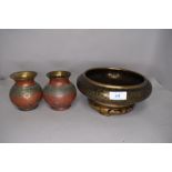 A Japanese cloisonne bowl having fine black ground with gold detailing and two Islamic style vase