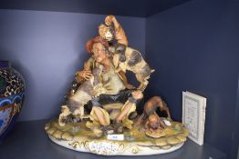 A Capodimonte figure limited edition of tramp and three dogs with certificate