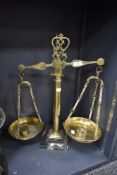 A set of antique apothecary or shop scales having brass cast frame on marble base