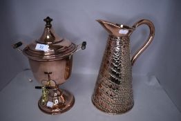 A fine copper tea urn or samovar having twin turned wood handles and top with similar Sankey