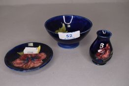 Three miniature ceramics by Moorcroft in deep blue glazes