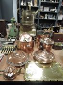 A collection of copper and brass including hot water can, kettle, pans and similar.