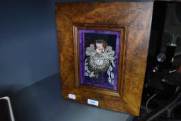 A collage of an English queen by Elizabeth Gilmartin in burr wood effect frame