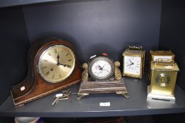 A selection of clocks including carriage style