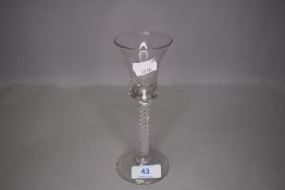 A cordial or wine glass having bell bowl on double twisted stem with footed base