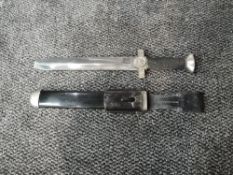 A German WW2 Red Cross Officer's Dress Dagger with Saw back edge and flat tip, blade marked Ges