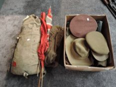 A collection of British Army Military Clothing including two Khaki Shirts, Two pairs of Trousers,