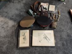 A collection of Militaria including Puttees, Leather Belt & Holster, Folding Dark Glasses, Cloth