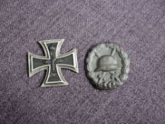 Two German WW1 Badges, Wound badge and Iron Cross 1813-1914, missing ring