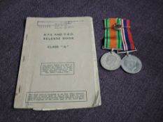 A pair of WW2 Medals, Defence and War to 301111 K Sharp ATS, married name Shields, Release Book