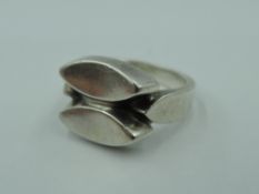 A silver dress ring by Georg Jensen, numbered 98, size M & approx 5.2g
