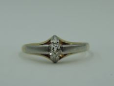 An old cut diamond solitaire, approx 0.065ct in a tension set mount to white metal shoulders on