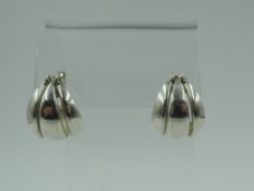 A pair of silver stud hoop earrings by Georg Jensen model no: 427 in the Melon design, approx 8.8g