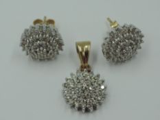 A pair of diamond cluster stud earrings, each having 37 brilliant cut diamonds in claw set 9ct white