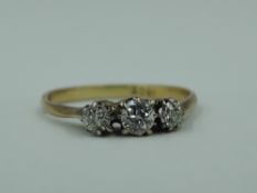 An old cut diamond trilogy ring, total approx 0.192ct in a raised claw set mount to knife blade