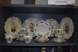 A part tea service by Queen Anne and four display plates