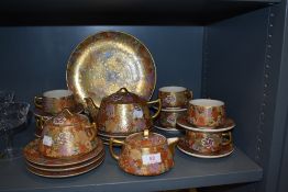 An impressive Japanese part tea service in a traditional Satsuma ware with millefiori thousand