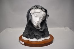 A figure bust study by Lladro of a female with veil having to damage to reverse of veil