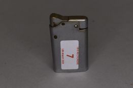A vintage Benlow master lighter.
