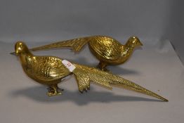 A pair of brass cast pheasant figures