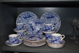 A part tea service by Royal Crown Derby in chintz style design