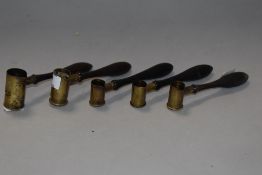 A group of five 19th century Shot measures, each with turned wooden handle
