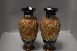 A pair of Royal Doulton 'Slaters Patent' stoneware vases, of traditional design and decoration,