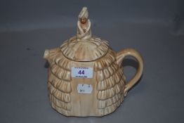 A mid-century Sadler type 'Yee Daintee Lady' teapot, in buff