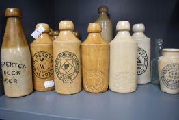 A selection of local stoneware bottles, ginger beer bottles etc