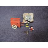 A Salco Series diecast Mickey and Minnie's Barrel Organ with music, red organ in original part box