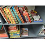 Two shelves of mixed vintage Children's Annuals and Story Books including Dandy, Victor, Topper,